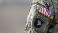 (FILES) In this file photo taken on March 07, 2018 a US flag is pictured on a soldier's uniform during the 'Dynamic Front 18' exercise in Grafenwoehr, near Eschenbach, southern Germany. AFP / CHRISTOF STACHE