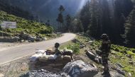 :TOPSHOT - Indian Border Security Force (BSF) soldiers guard a highway leading towards Leh, bordering China, in Gagangir on June 17, 2020. The long-running border dispute between Asian nuclear powers India and China turned deadly for the first time in nea