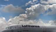 (FILES) In this file photo taken on June 11, 2020 an Airbus aircraft of the German airline Lufthansa is parked at the 