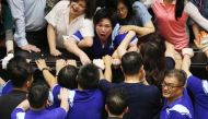 Lawmakers from Taiwan's ruling Democratic Progressive Party (DPP) scuffle with lawmakers from the main opposition Kuomintang (KMT) party, who have been occupying the Legislature Yuan, in Taipei, Taiwan, June 29, 2020. REUTERS/Ann Wang