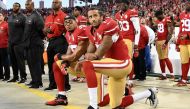  Former NFL star Colin Kaepernick, who launched kneeling protests during US national anthems to protest police brutality and racial injustice, will be the subject of a six-part series, Netflix announced June 29, 2020. / AFP / Thearon W. Henderson
