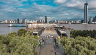 This overview taken on July 8, 2020 shows streets and walkways that lead to a dock inundated by floodwaters from the swollen Yangtze River following seasonal rains in Wuhan in China's central Hubei province. / AFP / STR