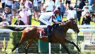 Sheail bin Khalifa Al Kuwari's Saqr, ridden by Vincent Cheminaud, on his way to win the Qatar Prix des Yearlings at the Qatar Prix Jean Prat at Deauville-La Touques Racecourse in Deauville, France, yesterday. 