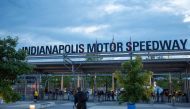 In this file photo taken on May 26, 2019, gates open for the 103rd running of the Indy 500 at the Indianapolis Motor Speedway in Indianapolis, Indiana. The Indy 500 has slashed spectator capacity for the second time in a month on July 21, 2020, but at 87,