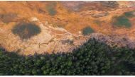 An aerial view shows an acid spill in an area around the Levikhinsky mine in Sverdlovsk region, Russia, July 17, 2020, in this still image taken from video. REUTERS TV/via REUTERS