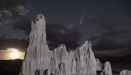 The Comet NEOWISE (C/2020 F3) is seen above a bentonite clay spire in the Panaca Formation on July 23, 2020 in Cathedral Gorge State Park, Nevada. The comet is named after NASA's Near-Earth Object Wide-field Infrared Survey Explorer, which discovered it i