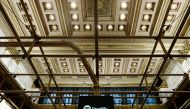 FILE PHOTO: The Spotify logo is displayed as the stock waits to begin selling as a direct listing on the floor of the New York Stock Exchange in New York, U.S., April 3, 2018. REUTERS/Lucas Jackson/File Photo