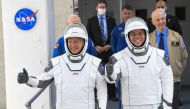 NASA commercial crew astronauts Doug Hurley, left, and Bob Behnken leave for their flight aboard the SpaceX Falcon 9 rocket on May 27, 2020. MUST CREDIT: Washington Post photo by Jonathan Newton