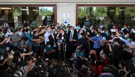Malaysia's former finance minister Lim Guan Eng (C) speaks to members of the media after posting bail outside the Duta Court complex in Kuala Lumpur on August 7, 2020, after being charged with corruption.  AFP / Mohd RASFAN