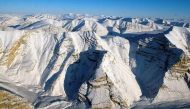 FILE PHOTO: Glaciers on Canada's Ellesmere Island are seen during a NASA Operation IceBridge survey flight April 1, 2014. Picture taken April 1, 2014. REUTERS/Michael Studinger/NASA/Handout/File Photo