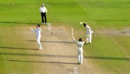 England's Chris Woakes celebrates winning the match with Dom Bess, as play resumes behind closed doors following the outbreak of the coronavirus disease (COVID-19). (Dan Mullan/ REUTERS)