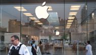 CHICAGO, ILLINOIS - AUGUST 10: Police inspect an Apple store that had windows broken after parts of the city had widespread looting and vandalism, on August 10, 2020 in Chicago, Illinois. Police made several arrests during the night of unrest and recovere