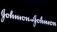 The company logo for Johnson & Johnson is displayed on a screen to celebrate the 75th anniversary of the company's listing at the New York Stock Exchange (NYSE) in New York, U.S., September 17, 2019. REUTERS/Brendan McDermid/File Photo