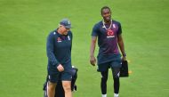 August 14, 2020 England head coach Chris Silverwood with Jofra Archer before the start of play, as play resumes behind closed doors following the outbreak of the coronavirus disease (COVID-19) Glyn Kirk/Pool via REUTERS