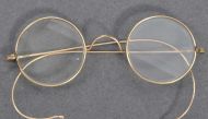 A handout picture released by East Bristol Auctions on August 19, 2020 shows a pair of glasses that once belonged to Indian independence icon Mohandas Karamchand Gandhi photographed at the action house in Bristol head of their sale. (AFP PHOTO / East Bris