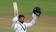 Pakistan's Azhar Ali celebrates after reaching his century on the third day of the third Test cricket match between England and Pakistan at the Ageas Bowl in Southampton, southern England on August 23, 2020