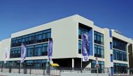 A provided picture of Wellington School building funded by The First Investor (TFI) Qatar, a leading Shariah-complaint investment arm of Barwa Bank. 
