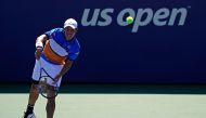 In this file photo taken on August 30, 2019, Kei Nishikori of Japan serves during his Men's Singles third round match against Alex de Minaur of Australia on day five of the 2019 US Open in New York City. / AFP / GETTY IMAGES NORTH AMERICA / GETTY IMAGES N