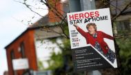 FILE PHOTO: A public health information advert is seen on a lampost as the spread of the coronavirus disease (COVID-19) continues, Dublin, Republic of Ireland, April 21, 2020 REUTERS/Jason Cairnduff
