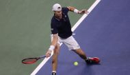 John Isner of the United States returns a volley during his Men's Singles first round match against Steve Johnson of the United States on Day One of the 2020 US Open at the USTA Billie Jean King National Tennis Center on August 31, 2020 in the Queens boro
