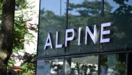 This file photo taken on May 29, 2020 shows the Alpine logo above the showroom in Boulogne Billancourt forfamly known as 'Societe Automobiles Alpine SAS', commonly known as Alpine. Renault will change the name of their Formula One team to Alpine from next