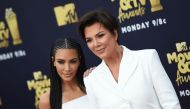 In this file photo taken on June 16, 2018 US TV personality Kim Kardashian (L) and her mother Kris Jenner attend the 2018 MTV Movie & TV awards, at the Barker Hangar in Santa Monica. / AFP / VALERIE MACON