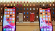 iPhones are displayed at the upcoming Apple Marina Bay Sands store in Singapore, September 8, 2020. REUTERS/Edgar Su
