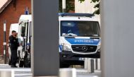 Police officers are seen outside Charite Mitte Hospital Complex after Russian opposition leader and President Vladimir Putin critic Alexei Navalny came out of a medically induced coma, in Berlin, Germany, September 10, 2020. REUTERS/Michele Tantussi