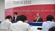 Tokyo 2020 Olympic Games CEO Toshiro Muto (top R) speaks during a press conference after a Tokyo 2020 executive board meeting in Tokyo on September 15, 2020. / AFP / POOL / Kazuhiro NOGI AND KAZUHIRO NOGI
