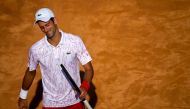 Serbia's Novak Djokovic reacts during his round 3 match against Serbia's Filip Krajinovic on day five of the Men's Italian Open at Foro Italico on September 18, 2020 in Rome, Italy. / AFP / POOL / Riccardo Antimiani