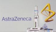 FILE PHOTO: A test tube labelled with the Vaccine is seen in front of AstraZeneca logo in this illustration taken, September 9, 2020. REUTERS/Dado Ruvic/Illustration/File Photo