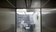 A worker is seen at the facility of Chinese vaccine maker Sinovac Biotech, developing an experimental coronavirus disease (COVID-19) vaccine, during a government-organized media tour in Beijing, China, September 24, 2020. REUTERS/Thomas Peter