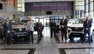 Senior officials of AAB posing for a picture with new Toyota Fortuner 2020 model cars.