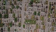 (FILES) This file aerial photo taken on July 28, 2020 shows a view of graves at the special area for COVID-19 victims of the Municipal Pantheon of Valle de Chalco, State of Mexico. / AFP / ALFREDO ESTRELLA
