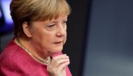 German Chancellor Angela Merkel attends a session of the German lower house of parliament Bundestag, in Berlin, Germany, September 30, 2020. REUTERS/Hannibal Hanschke
