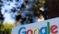 FILE PHOTO: After the company announced it would extend its coronavirus work-from-home order until summer 2021, a Google sign is shown at one of the company's office complexes in Irvine, California, U.S., July 27, 2020. REUTERS/Mike Blake