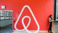 A woman talks on the phone at the Airbnb office headquarters in the SOMA district of San Francisco, California, U.S., August 2, 2016. REUTERS/Gabrielle Lurie/File Photo