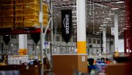 The logo of Amazon is seen at their new Amazon warehouse during its opening announcement on the outskirts of Mexico City, Mexico July 30, 2019. Picture taken July 30 2019. REUTERS/Carlos Jasso/File Photo