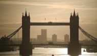 Traffic passes over the River Thames on Tower Bridge in London during the morning rush hour on October 15, 2020. AFP / Daniel Leal-Olivas 