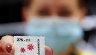 An employee of the Austrian postal service displays a so called 