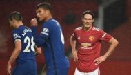 Manchester United's Uruguayan striker Edinson Cavani (R) reacts during the English Premier League football match between Manchester United and Chelsea at Old Trafford in Manchester, north west England, on October 24, 2020. AFP / POOL / Oli SCARFF  
