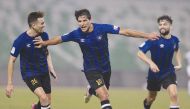 Al Sailiya's Mohanad Ali (centre) celebrates after scoring his second goal yesterday.