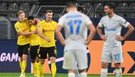 Dortmund's Norwegian forward Erling Braut Haaland (L) celebrates scoring with the 2-0 goal his team-mates during the UEFA Champions League group F football match BVB Borussia Dortmund v FC Zenit Saint Petersburg in Dortmund, western Germany on October 28,