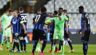 Soccer Football - Champions League - Group F - Club Brugge v Lazio - Jan Breydel Stadium, Brugge, Belgium - October 28, 2020 Lazio’s Jean-Daniel Akpa Akpro and Club Brugge's Simon Deli after the match REUTERS/Francois Lenoir
