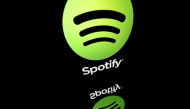 This file illustration taken on April 19, 2018 shows the logo of online streaming music service Spotify displayed on a tablet screen in Paris. Music streaming giant Spotify said Thursday, October 29, 2020 that its number of monthly active users passed the