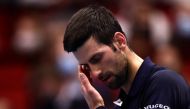 Serbia's Novak Djokovic reacts during his quarter-final match against Italy's Lorenzo Sonego REUTERS/Lisi Niesner