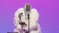 (FILES) In this file photo taken on August 30, 2020 this handout image released courtesy of MTV shows US singer-songwriter Lady Gaga accepting the award for Artist of the Year during the 2020 MTV Video Music Awards, being held virtually amid the coronavir