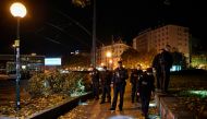 Police officers search in an area after exchanges of gunfire in Vienna, Austria November 3, 2020. REUTERS/Radovan Stoklasa
