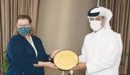 The President of the Qatar Football Association (QFA), Sheikh Hamad bin Khalifa bin Ahmed Al Thani, presenting a memento to Chargé d’Affaires of the US embassy in Doha, Ambassador H E Greta C Holtz, during a meeting in Doha yesterday.