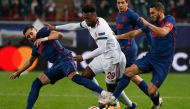 Atletico Madrid's Mexican midfielder Hector Herrera, Lokomotiv Moscow's Cape Verdean forward Ze Luis and Atletico Madrid's Spanish midfielder Koke vie for the ball during the UEFA Champions League football match between Lokomotiv Moscow and Atletico Madri